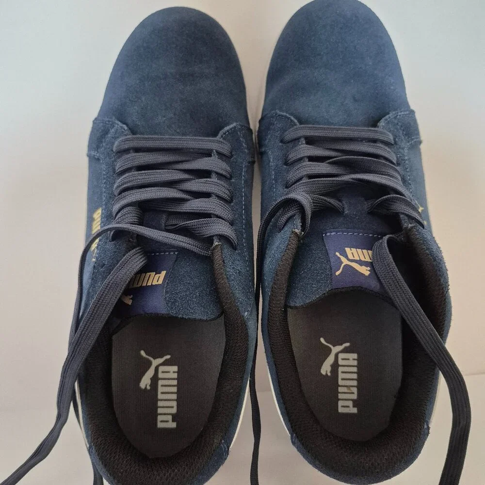 Puma men's hard toe safety shoes, size 10.